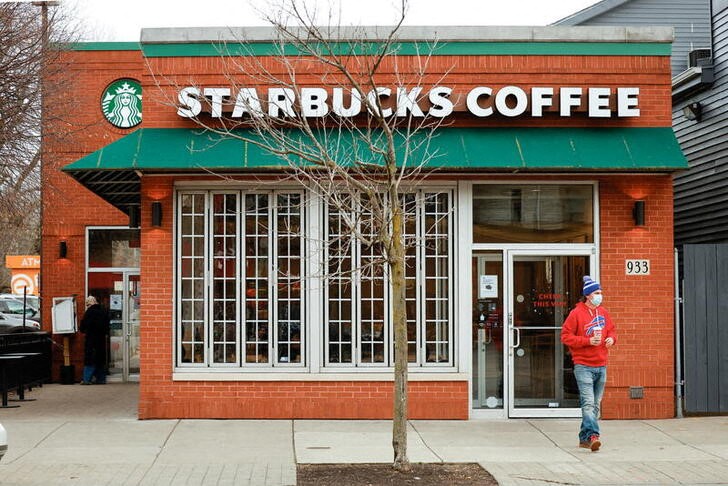 FILE PHOTO: Customer exits a Starbucks in Buffalo, New York