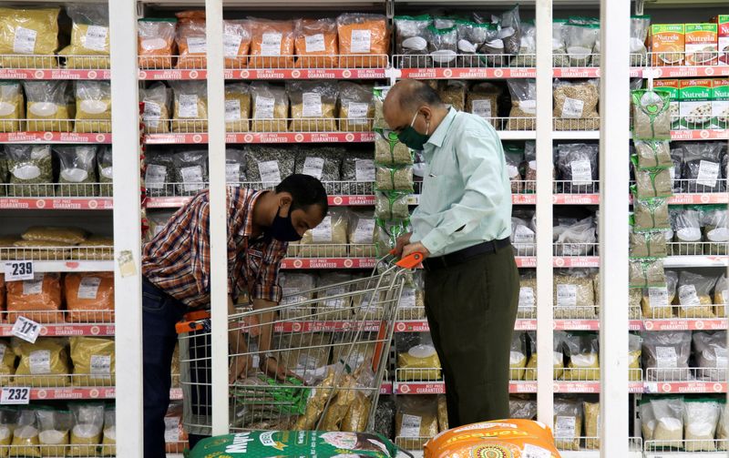 FILE PHOTO: People shop at a Future Group Big Bazaar