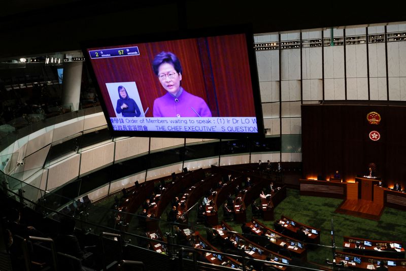 Chief Executive Carrie Lam takes questions from lawmakers during the
