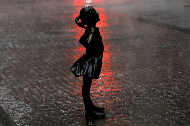 FILE PHOTO: The Fearless Girl statue is seen while heavy