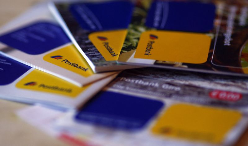 An illustration picture shows brochures of the Postbank AG