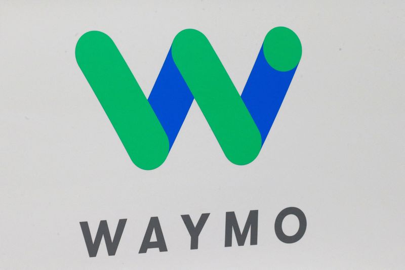 The Waymo logo is displayed during the company’s unveil of