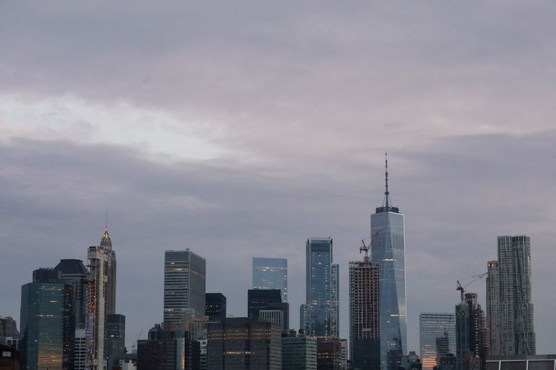The skyline of lower Manhattan is seen before sunrise in