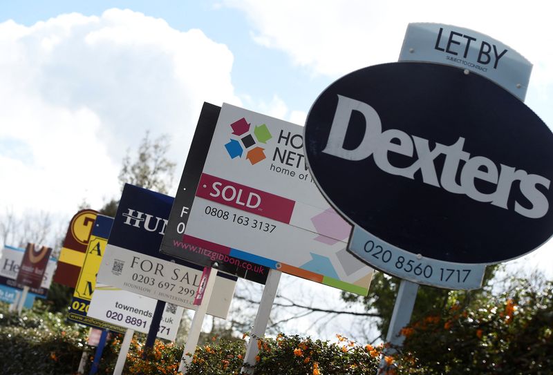 FILE PHOTO: Property estate agent sales and letting signs are