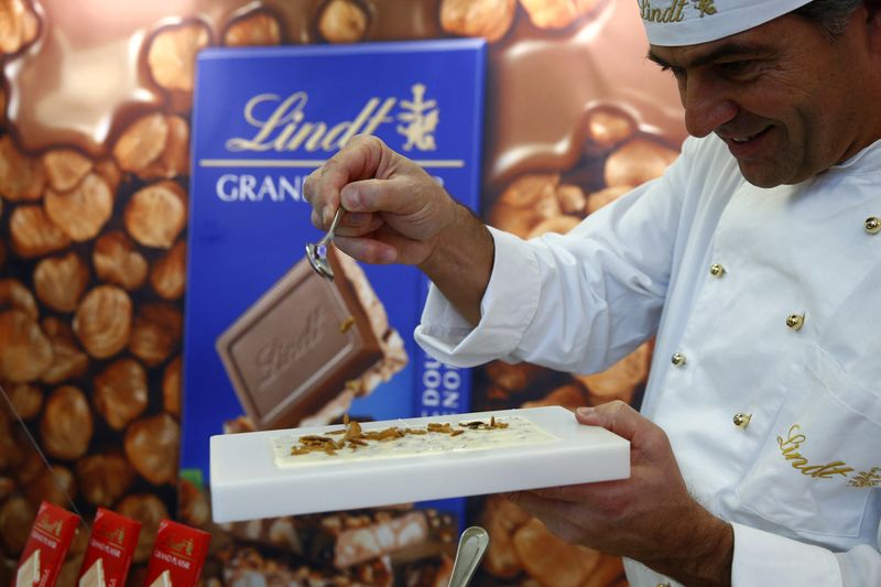 A Maitre Chocolatier of Swiss chocolatier Lindt & Spruengli prepares