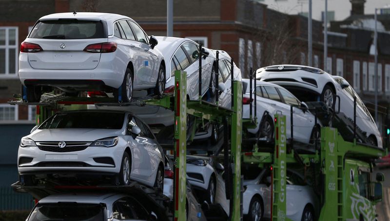 FILE PHOTO: Vauxhall cars are transported on a lorry in