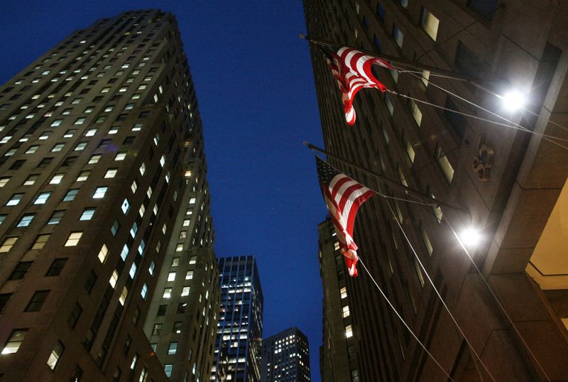 FILE PHOTO: Flags fly outside 85 Broad St., the Goldman