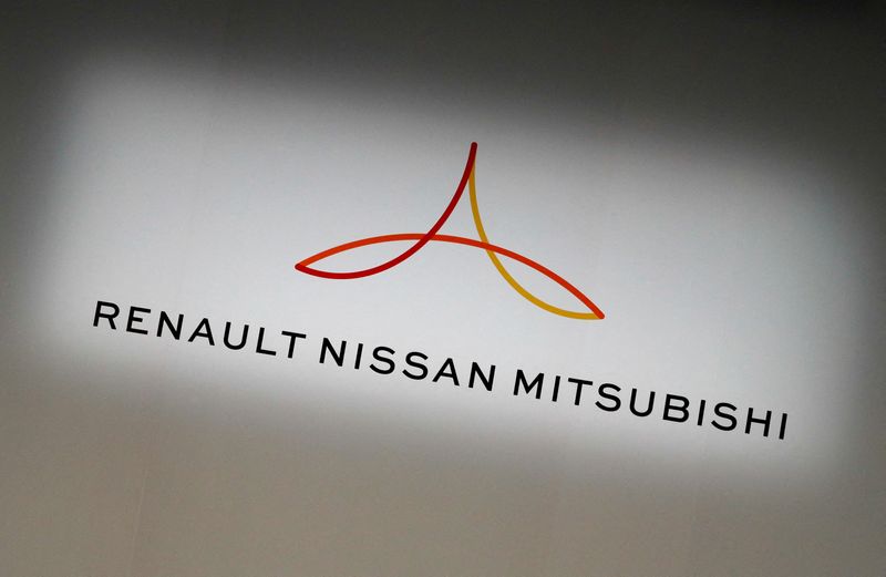 FILE PHOTO: Renault, Nissan and Mitsubishi chiefs hold a news