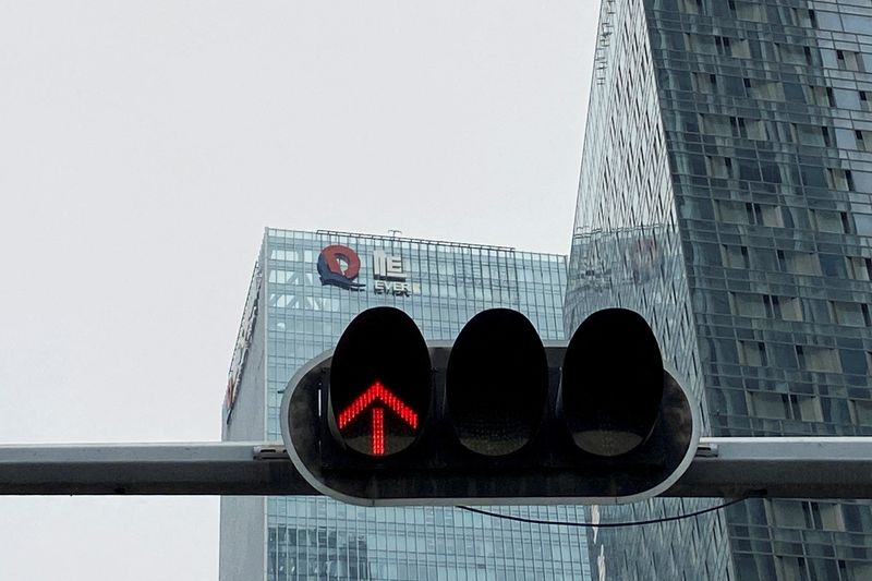 FILE PHOTO: Partially removed company logo of China Evergrande Group