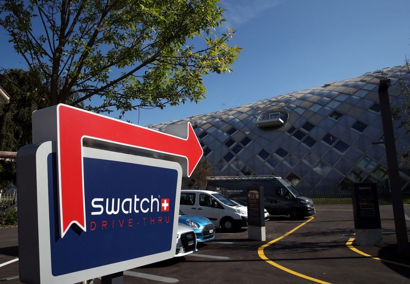 A Swatch logo is pictured in front of the newly