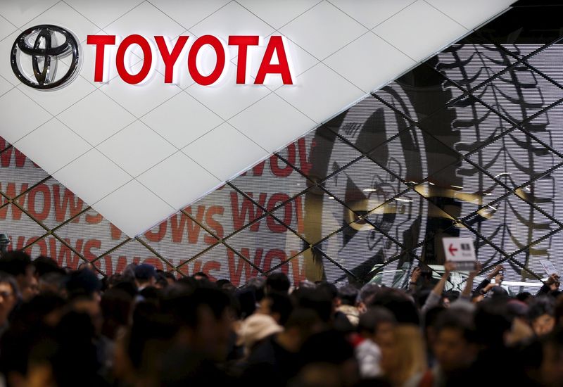 Visitors crowd Toyota Motor Corp’s booth at the 44th Tokyo