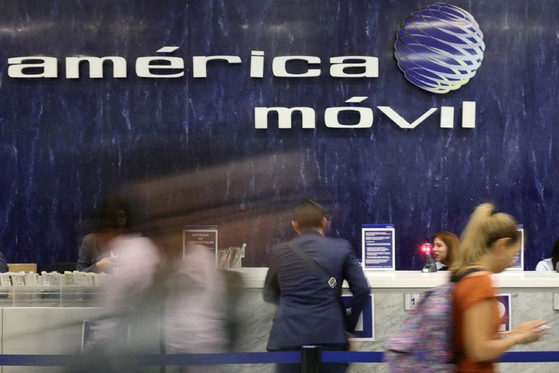 FILE PHOTO: The logo of America Movil is pictured on