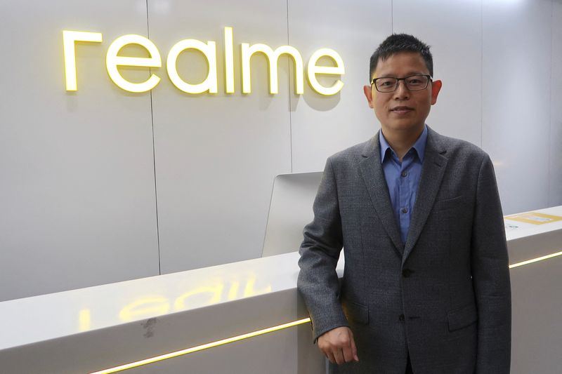 Realme CEO and founder Sky Li poses for a picture
