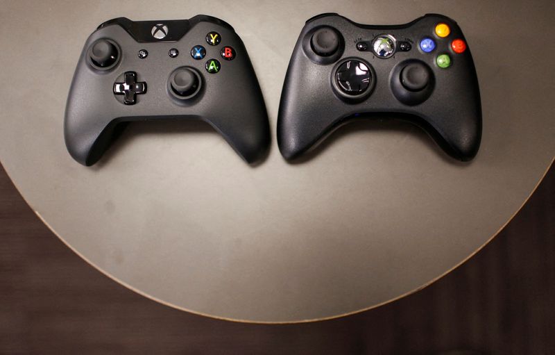 FILE PHOTO: The new Xbox One controller next to the