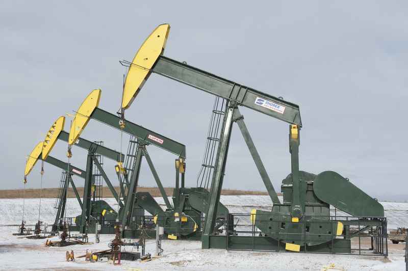 FILE PHOTO: Pumpjacks taken out of production temporarily stand idle