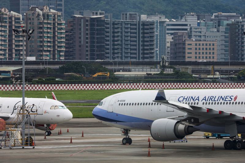 Passenger jets of Taiwan’s China Airlines at Taipei Songshan Airport