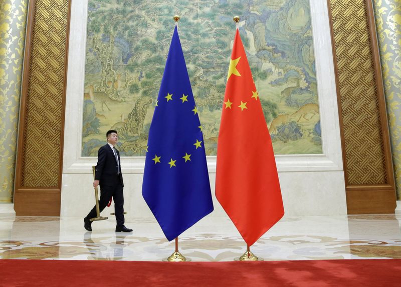 A staff member prepares for the EU-China High-level Economic Dialogue