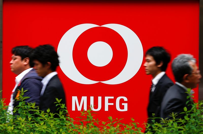 People walk past a branch of Mitsubishi UFJ  Financial