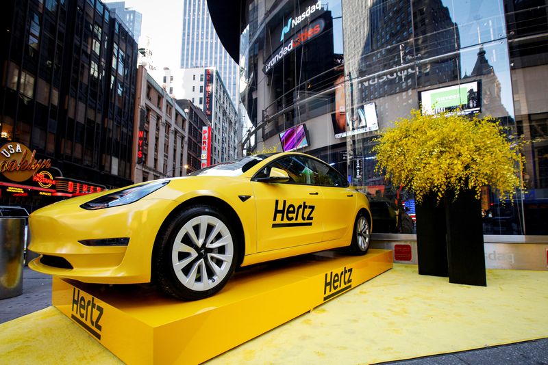 A Hertz Tesla electric vehicle is displayed during the Hertz