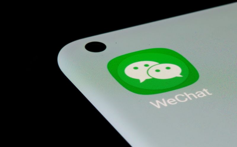 WeChat app is seen on a smartphone in this illustration