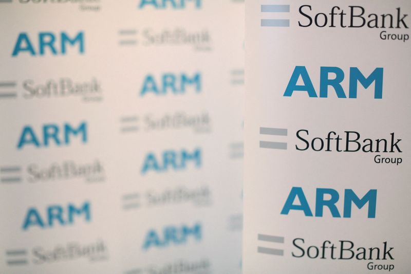 FILE PHOTO: An ARM and SoftBank Group branded board is