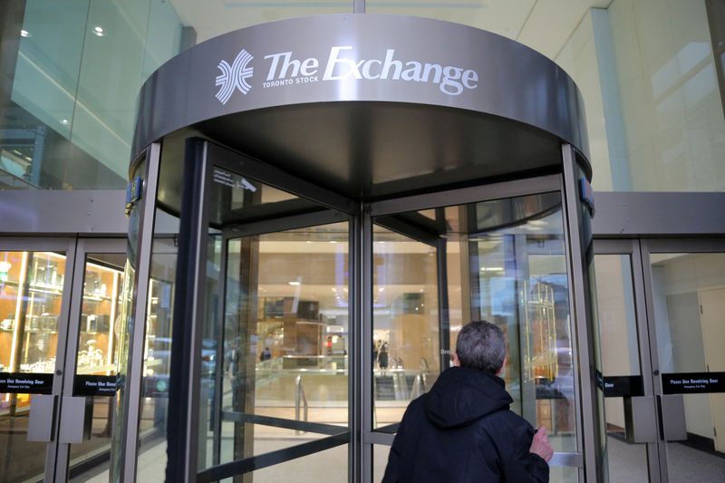 FILE PHOTO – A Toronto Stock Exchange sign adorns a