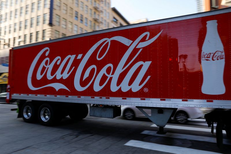 FILE PHOTO: A Coca-Cola truck makes its way through downtown