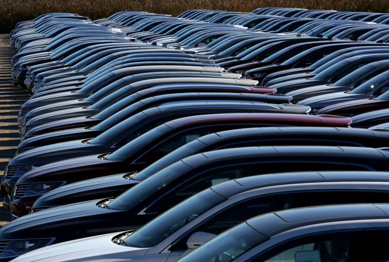 FILE PHOTO: Ford and Lincoln vehicles are parked outside the