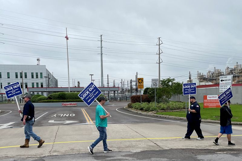 FILE PHOTO: Union members picket outside Exxon Mobil refinery in