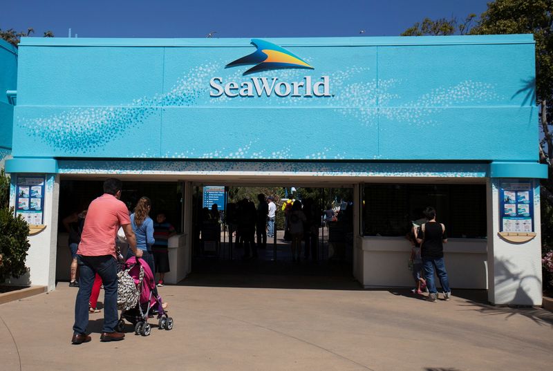FILE PHOTO: Visitors attend the animal theme park SeaWorld in