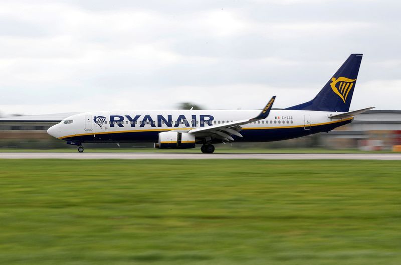 FILE PHOTO: A Ryanair aircraft lands on the southern runway