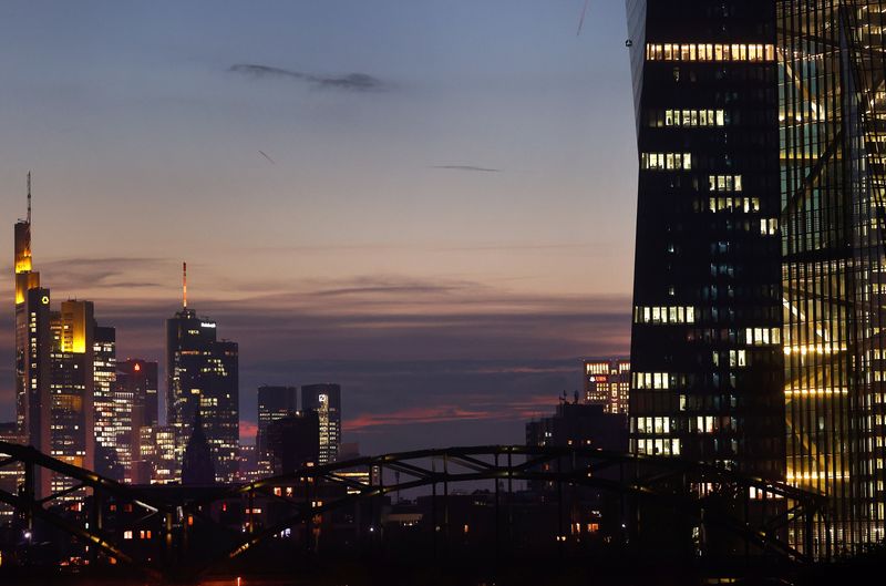 FILE PHOTO – Sun sets over the skyline and ECB