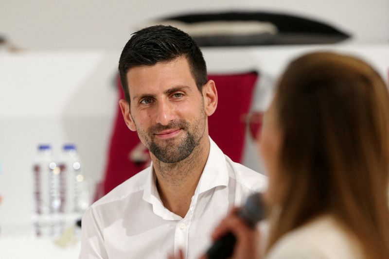 Tennis player Novak Djokovic visits the Serbia pavilion at Expo