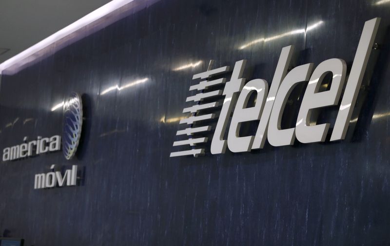 The logos of America Movil and its commercial brand Telcel
