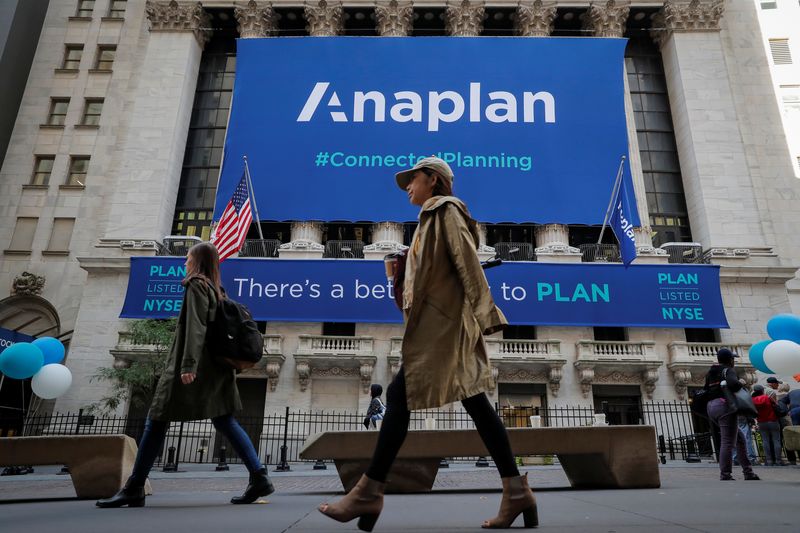 A banner for Anaplan, Inc. hangs on the facade of