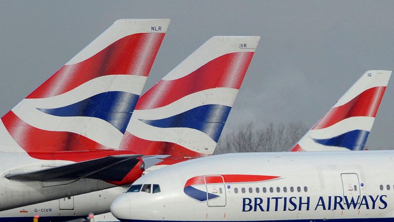 FILE PHOTO: British Airways aircraft are parked at Heathrow Airport