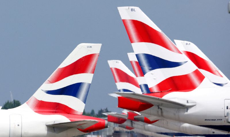 FILE PHOTO: British Airways tail fins are pictured at Heathrow