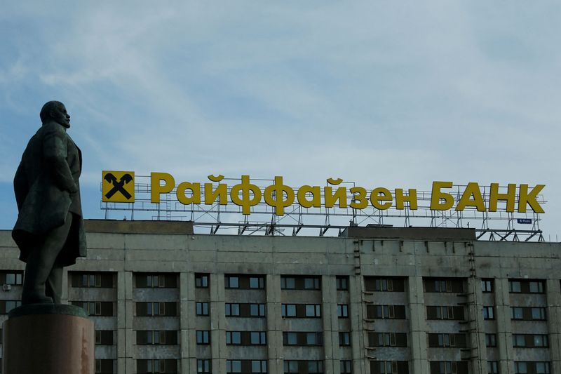 FILE PHOTO: Logo of Raiffeisen Bank on top of building
