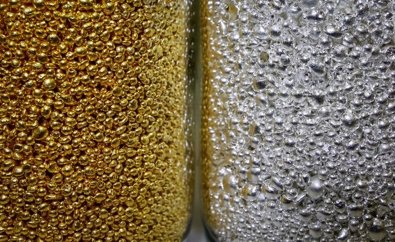 FILE PHOTO: Granules of 99.99 percent pure gold and silver