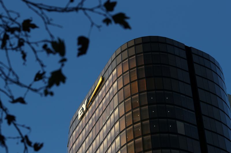 An office building with Ernst & Young (EY) logo is