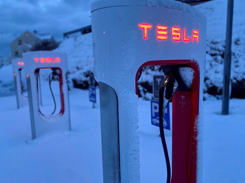 FILE PHOTO: Tesla electric vehicle chargers are seen during the