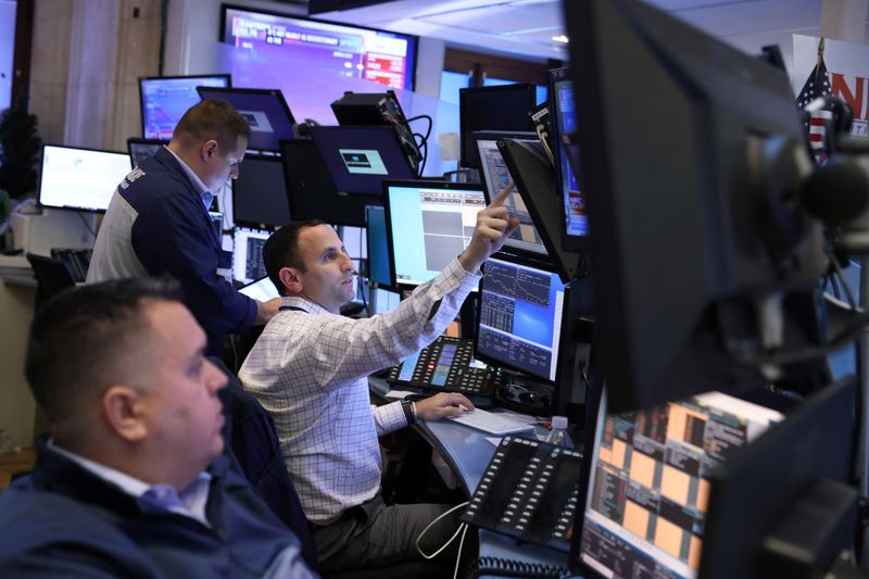 Traders work on the trading floor at the New York