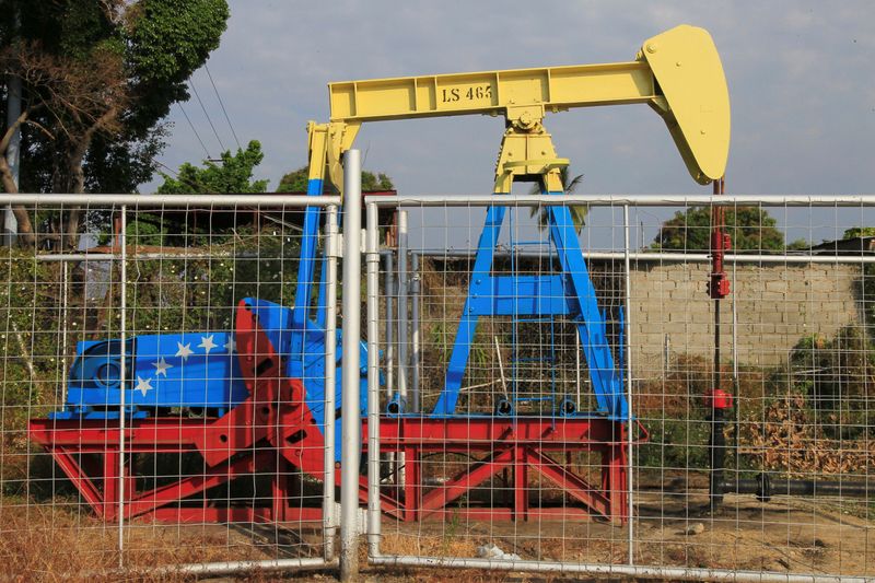 An oil pumpjack painted with the colors of the Venezuelan