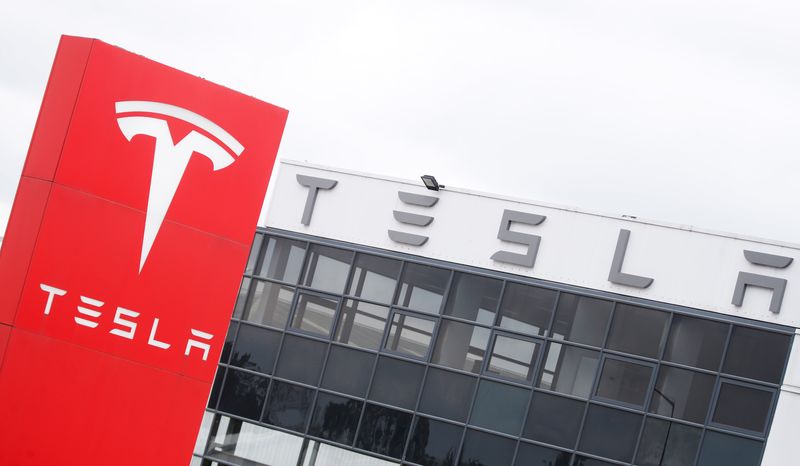 The logo of car manufacturer Tesla is seen at a