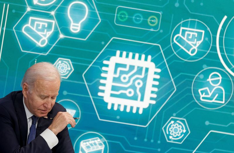 U.S. President Biden and Commerce Secretary Raimondo hold a virtual