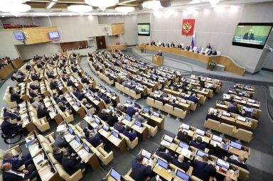 FILE PHOTO: Russian lawmakers attend a session of the lower