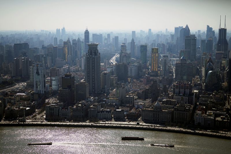 FILE PHOTO: View of the city skyline and Huangpu river