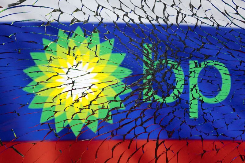 Illustration shows BP logo and Russian flag through broken glass