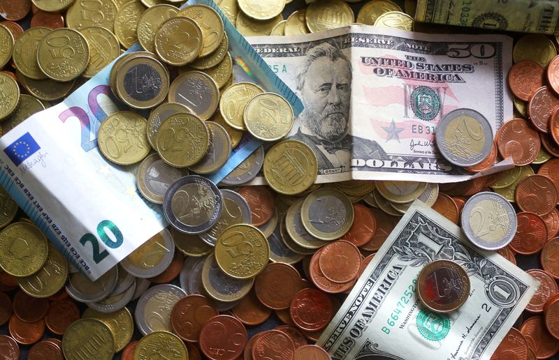 FILE PHOTO: An illustration picture shows euro and US dollar