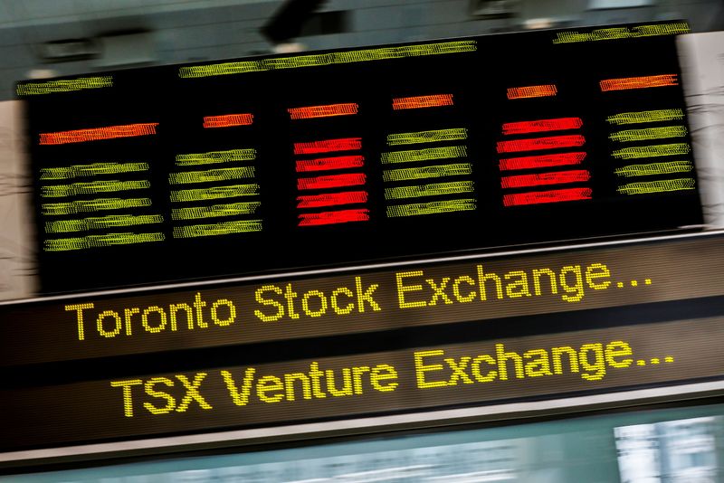 FILE PHOTO: A sign board displaying Toronto Stock Exchange stock